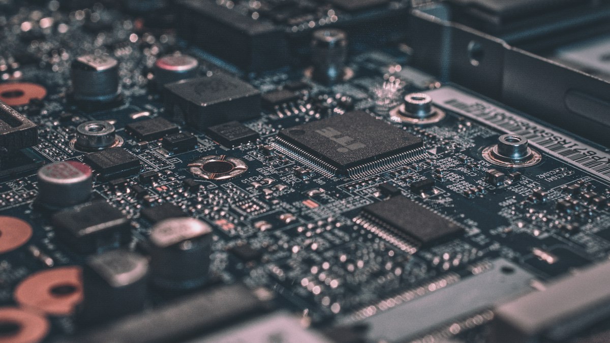 Close-up macro illustration of advanced semiconductor silicon wafer and microchip